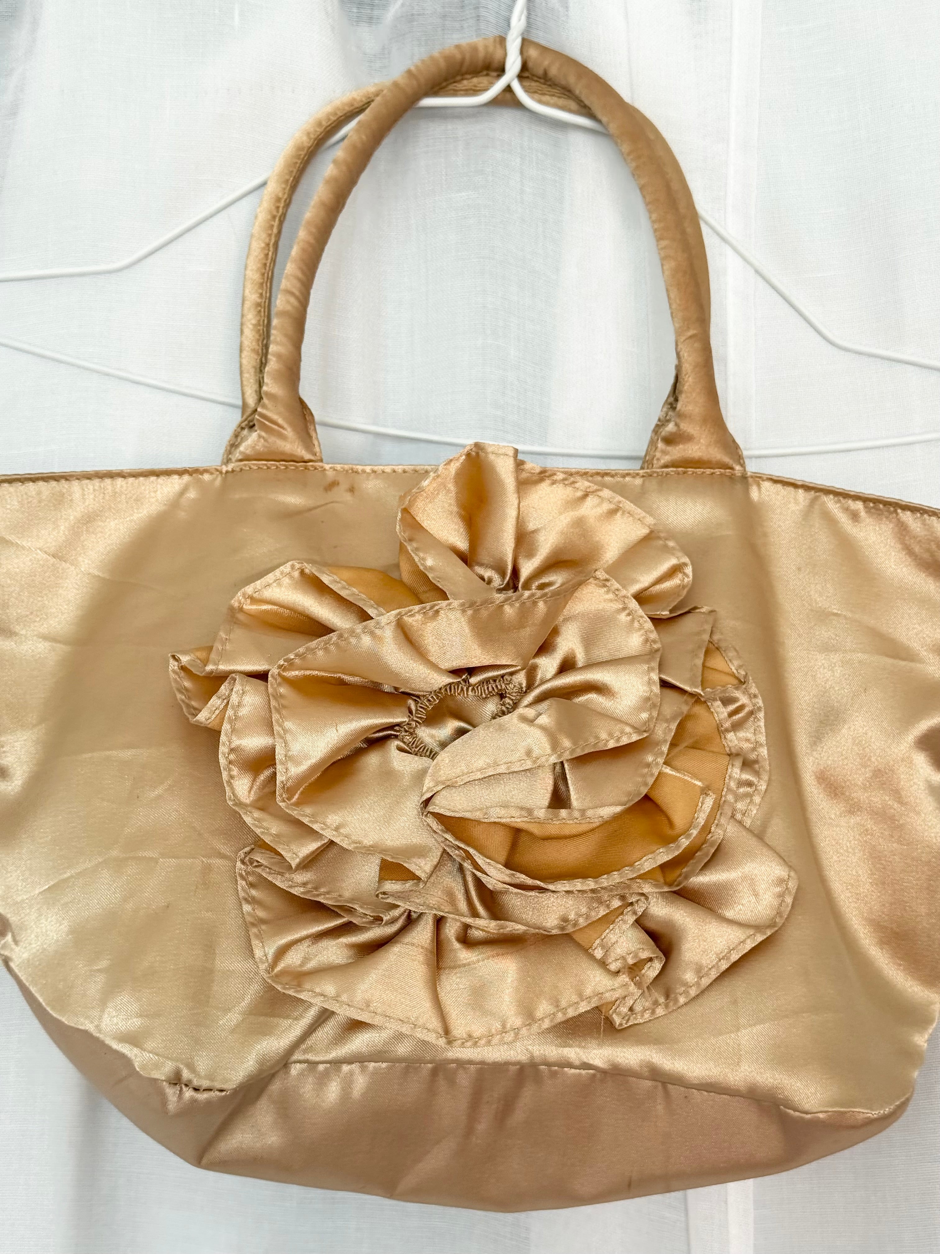 gold satin rosette mini bag