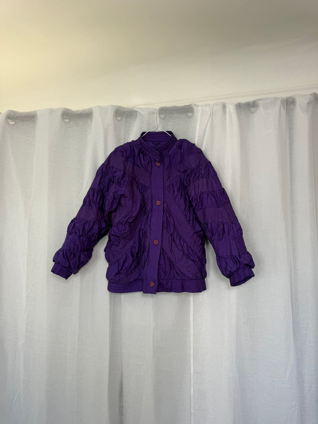 purple quilted nylon jacket