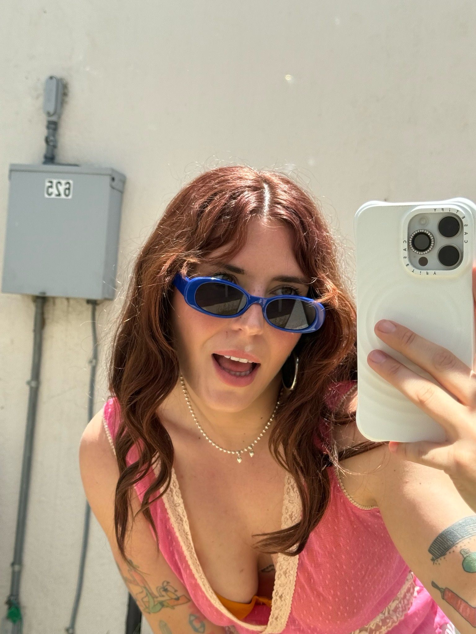 navy oval sunglasses