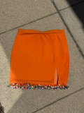 orange beaded mini skirt