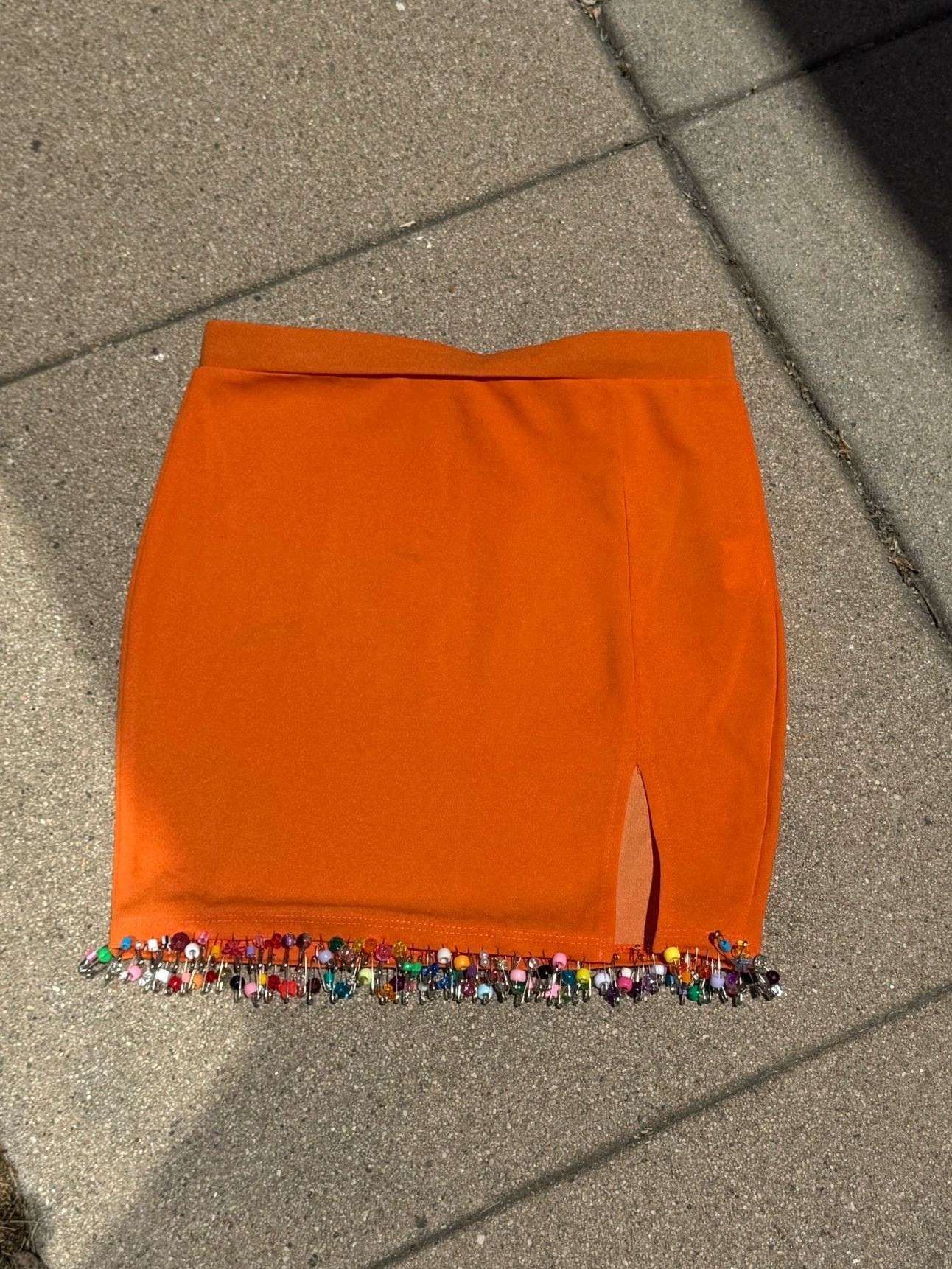 orange beaded mini skirt
