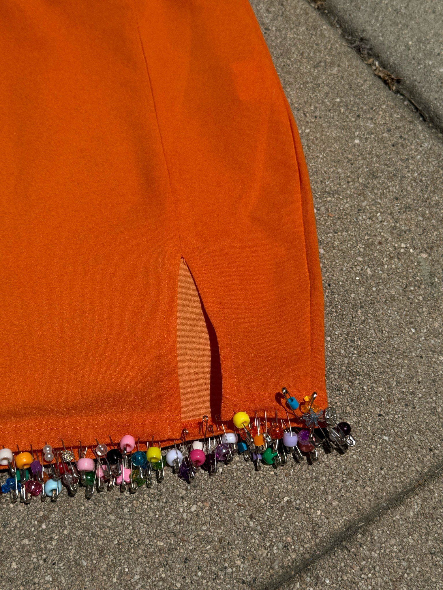 orange beaded mini skirt