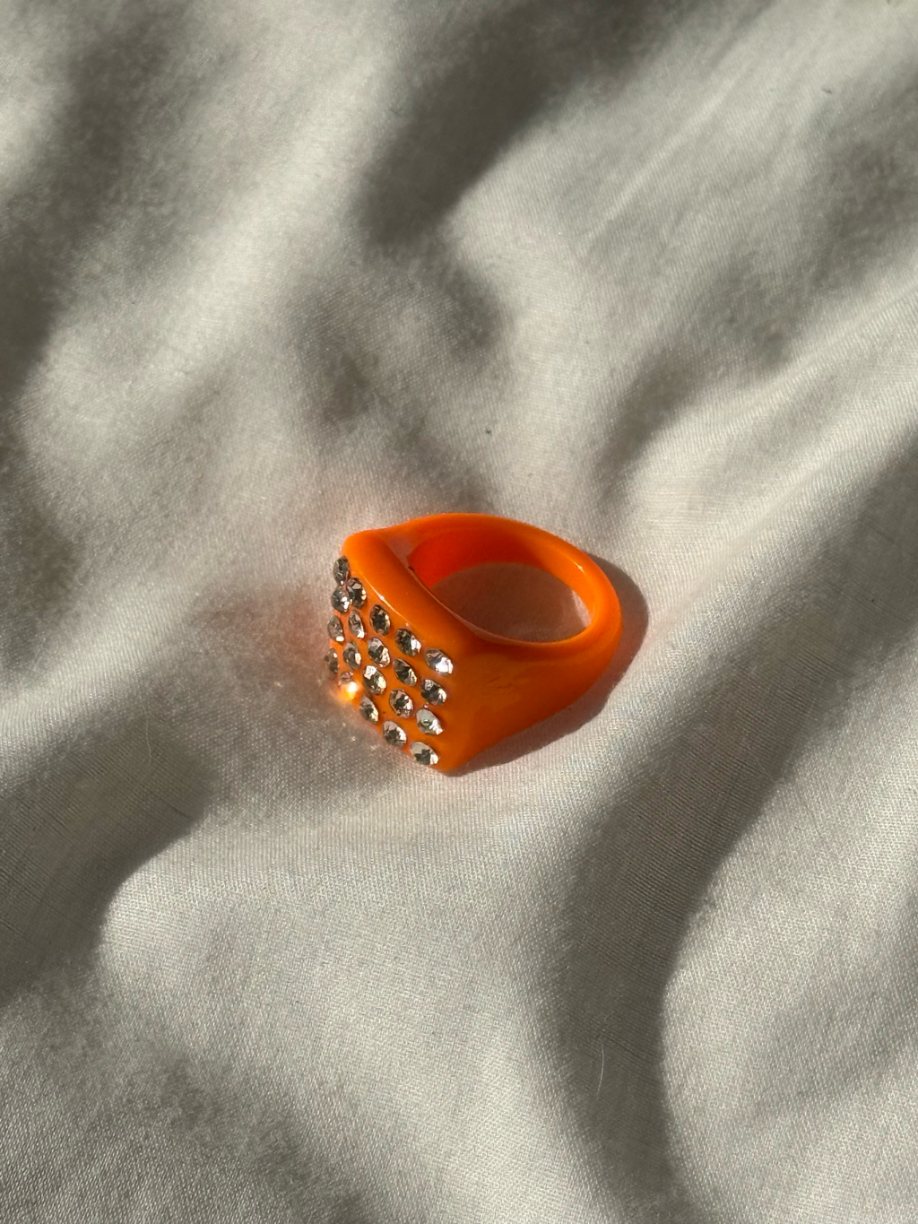 orange rhinestone ring