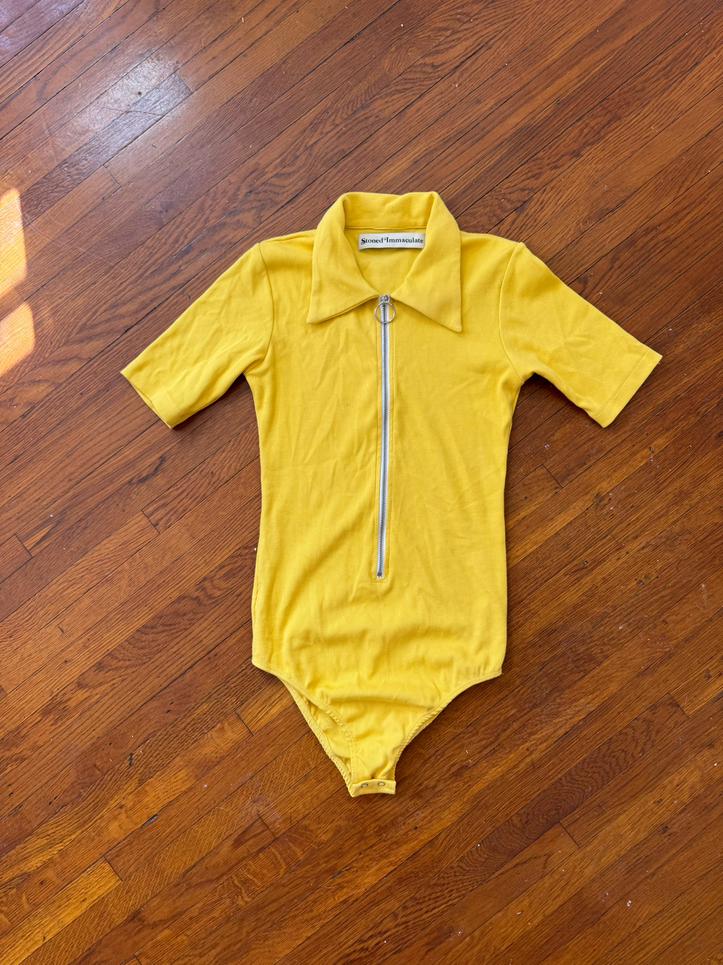 stoned immaculate onesie