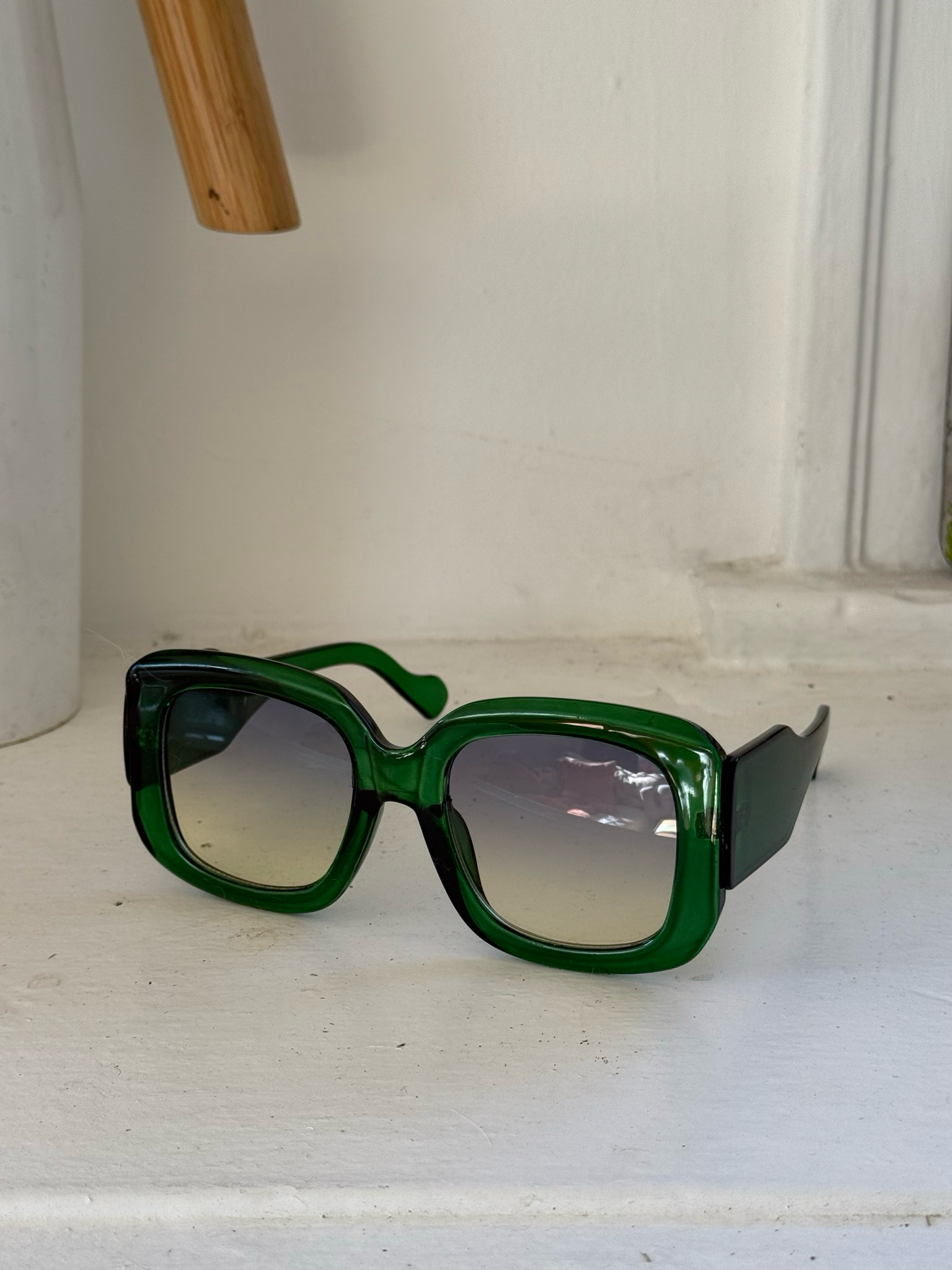 green oversized sunnies