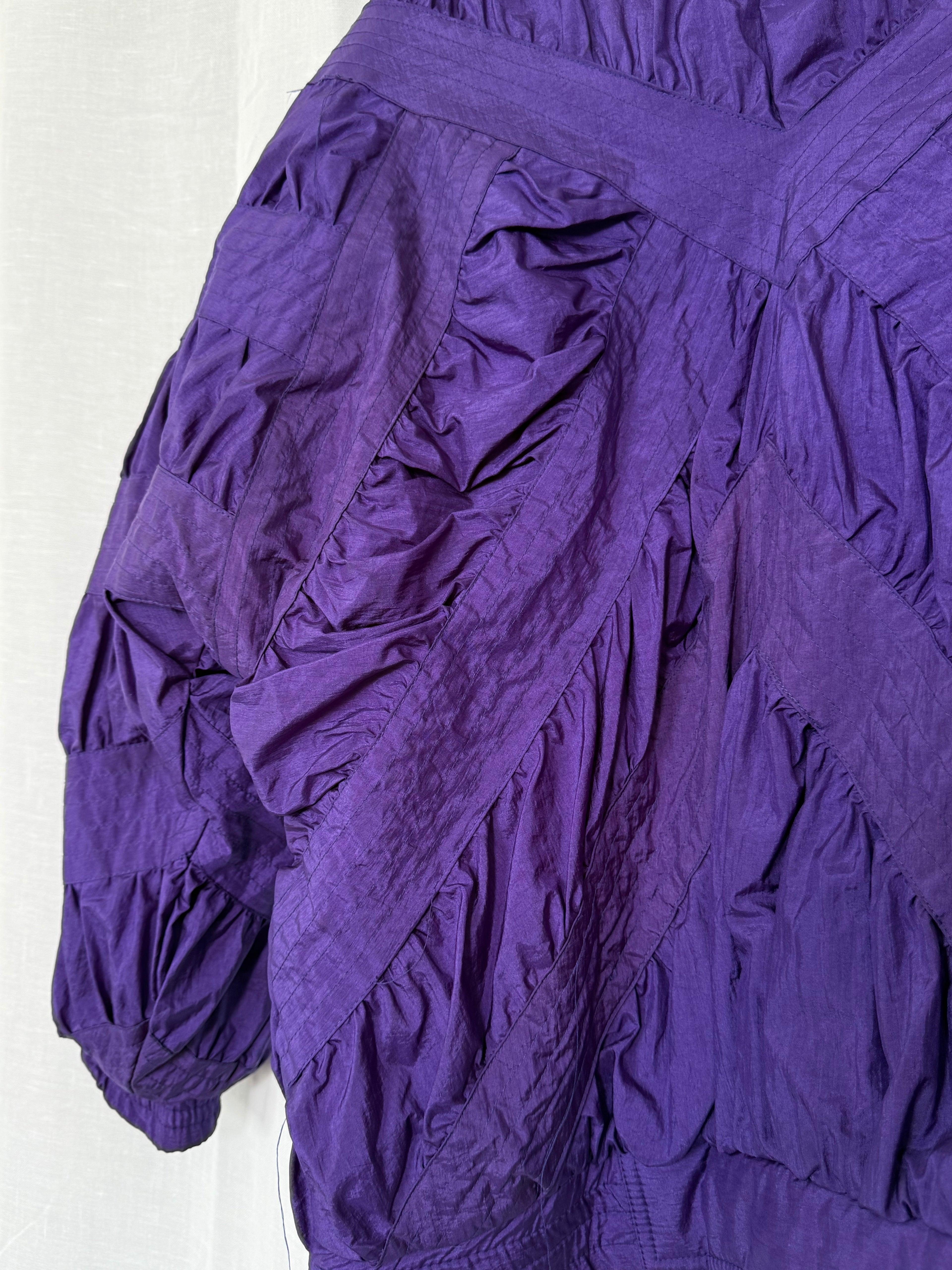 purple quilted nylon jacket