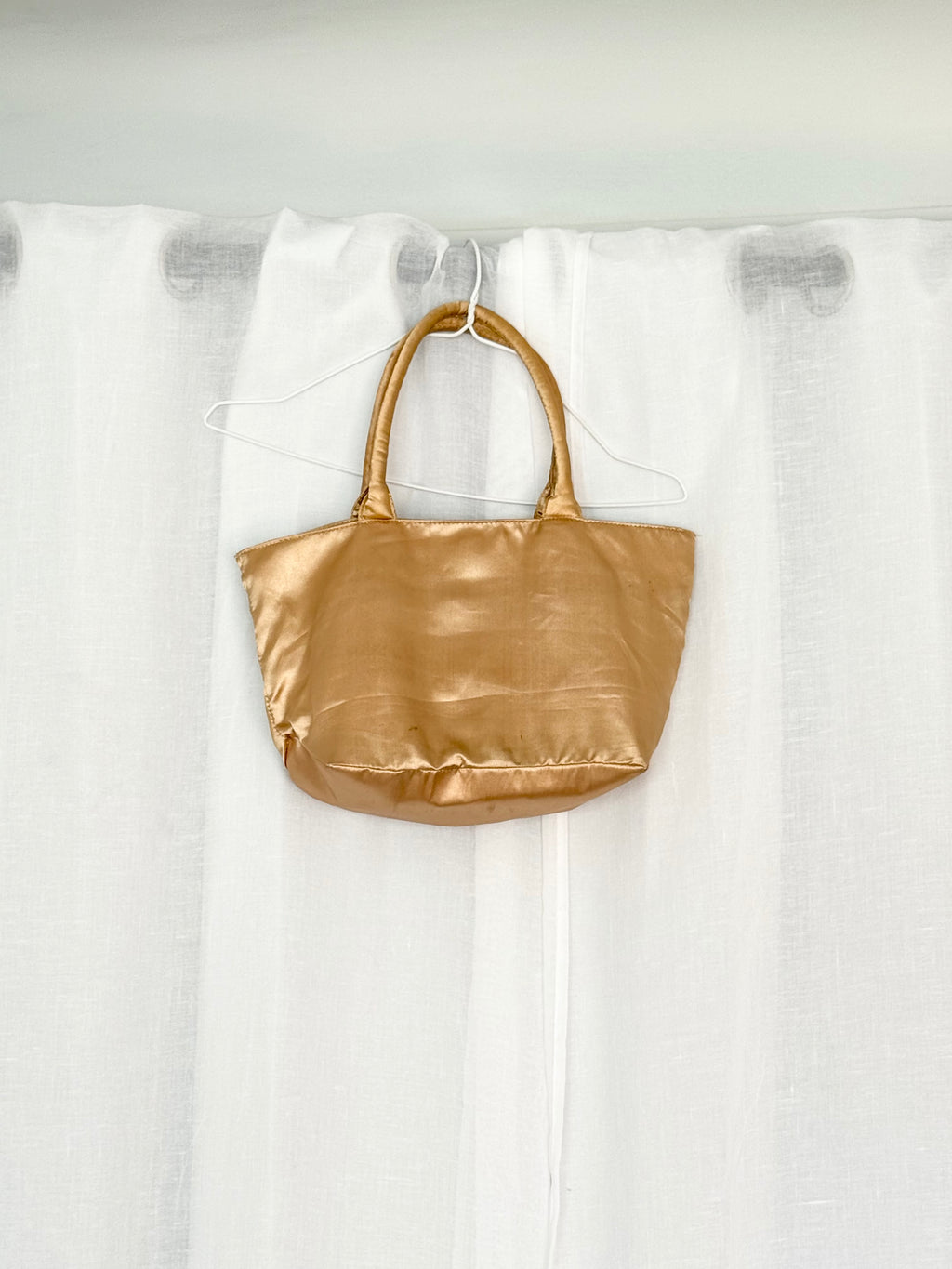 gold satin rosette mini bag
