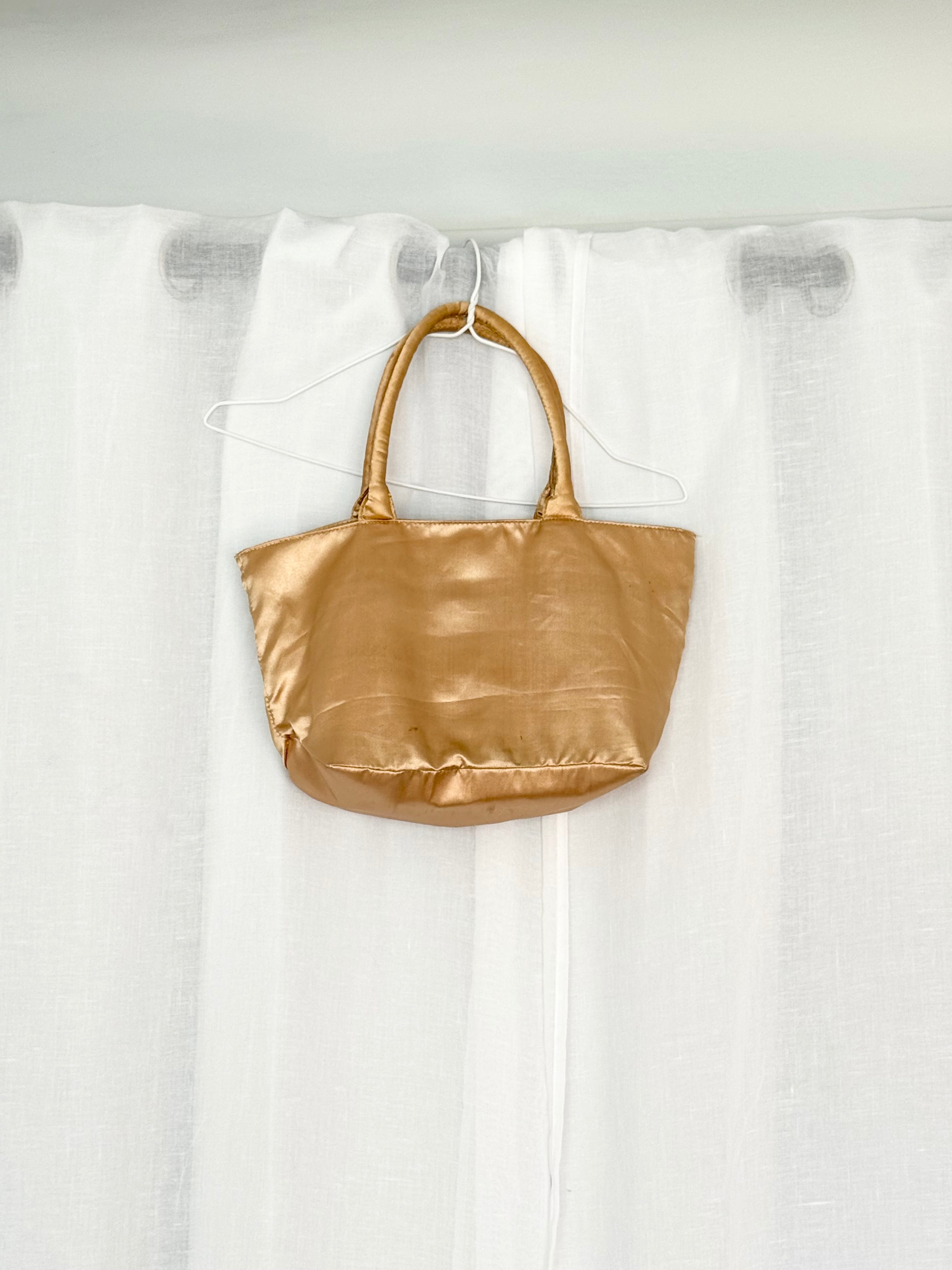 gold satin rosette mini bag