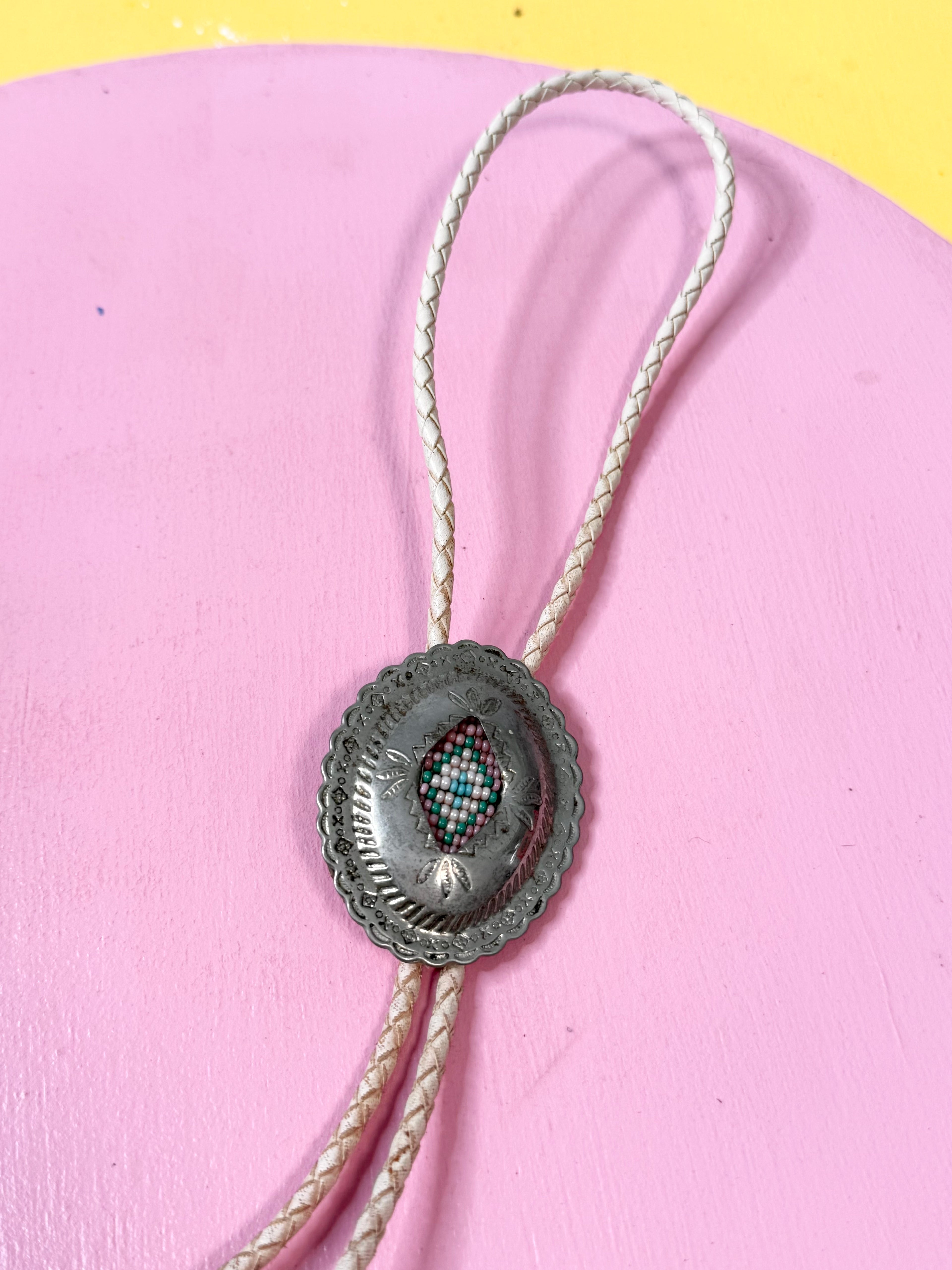 vintage baby pink bolo tie
