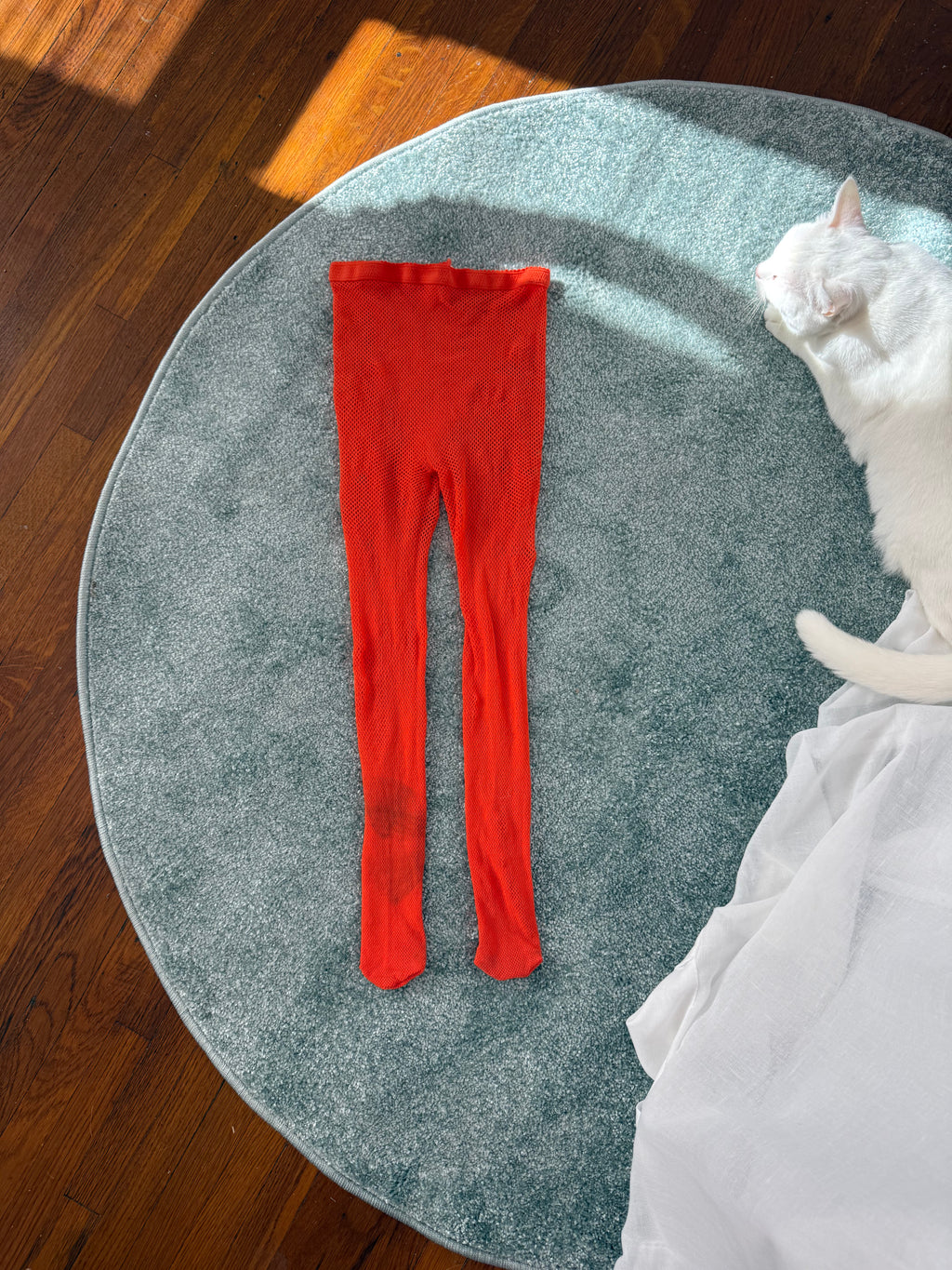 orange fishnet tights / leggings