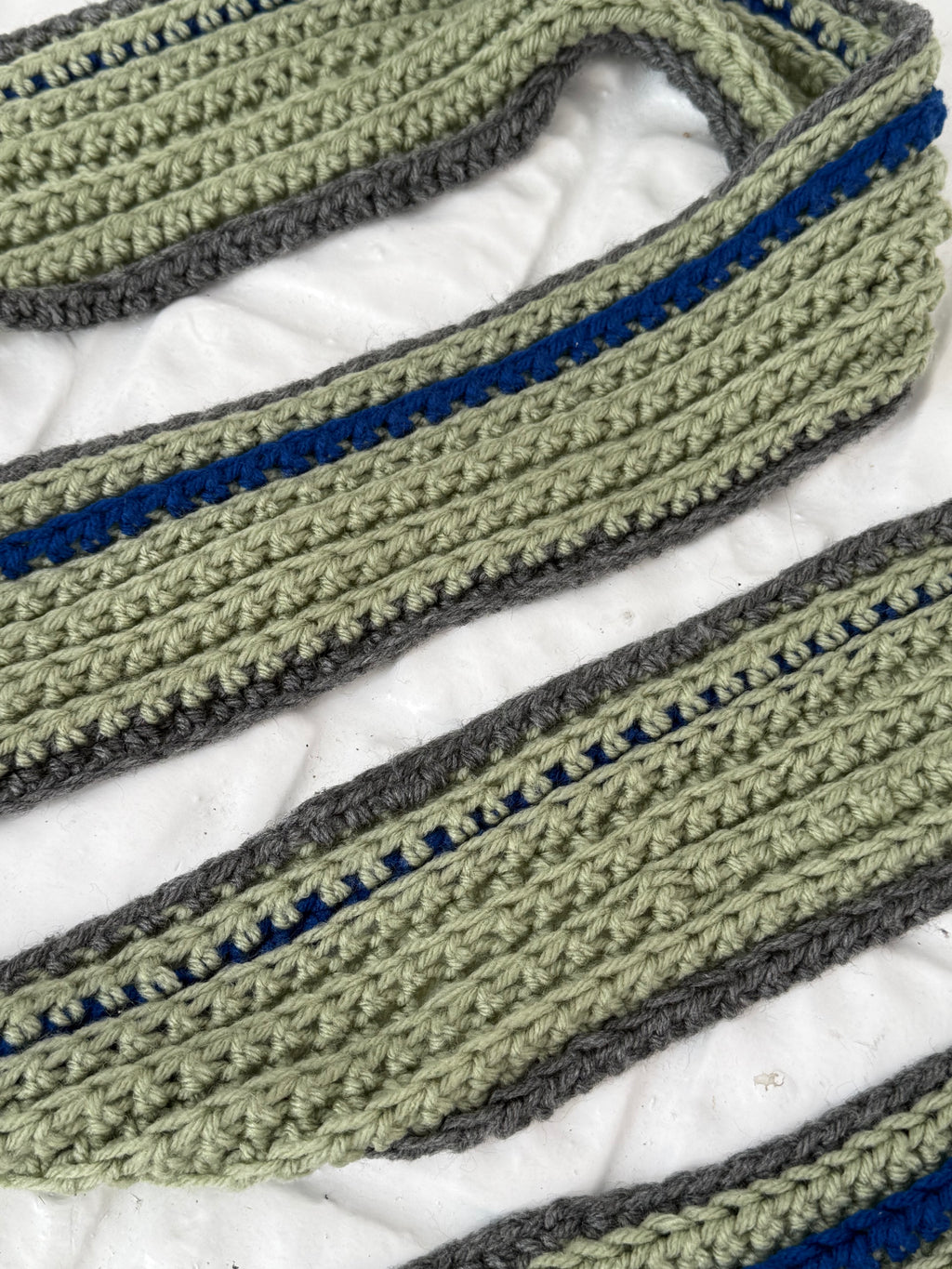 hand-crocheted striped knit scarf