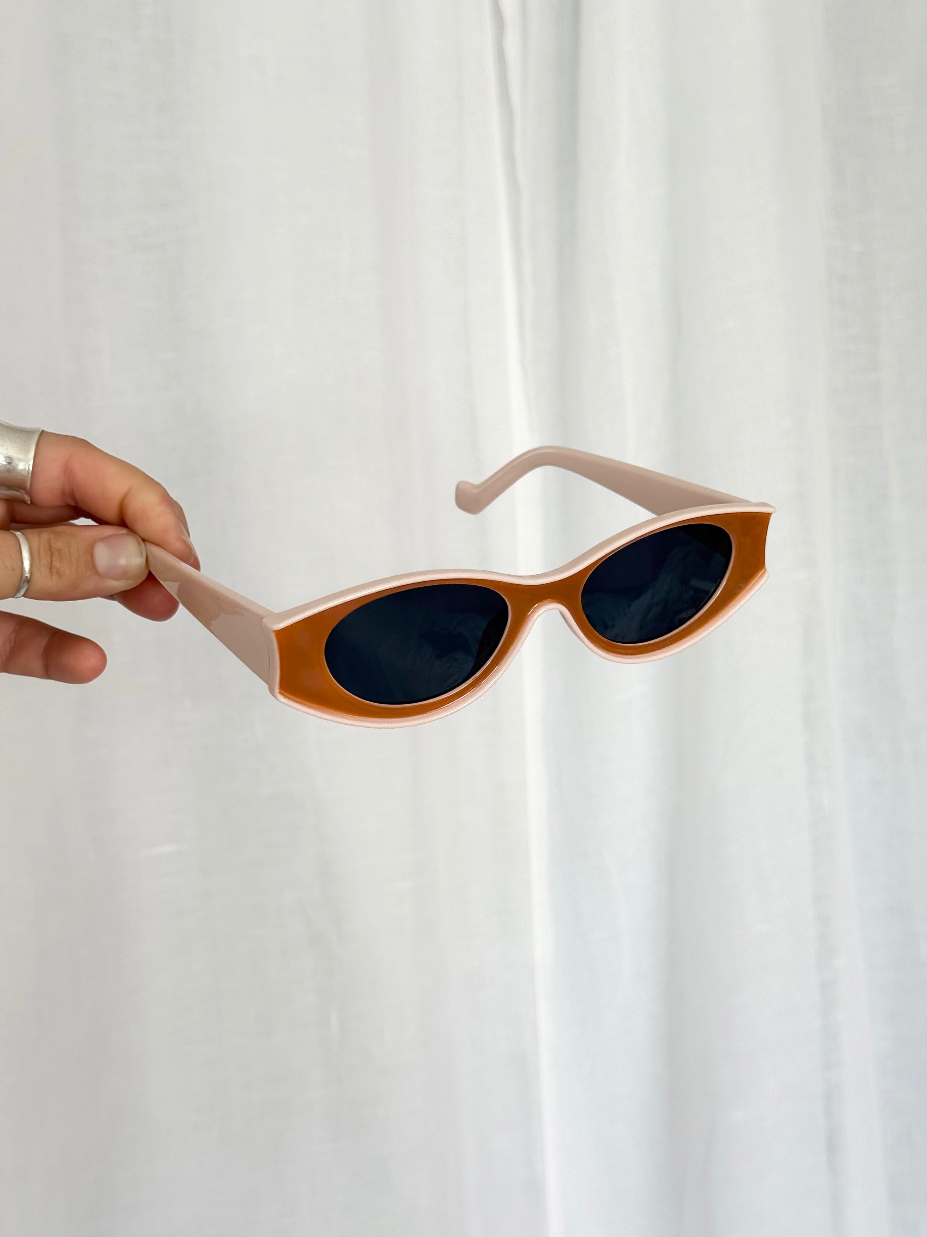 brown and pink oval slim sunglasses