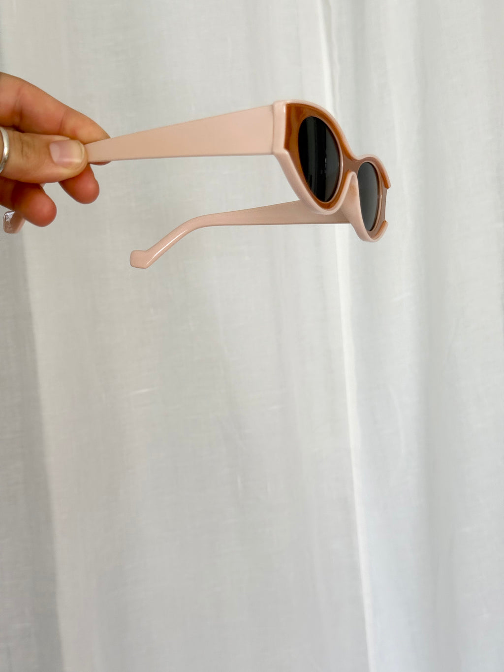 brown and pink oval slim sunglasses