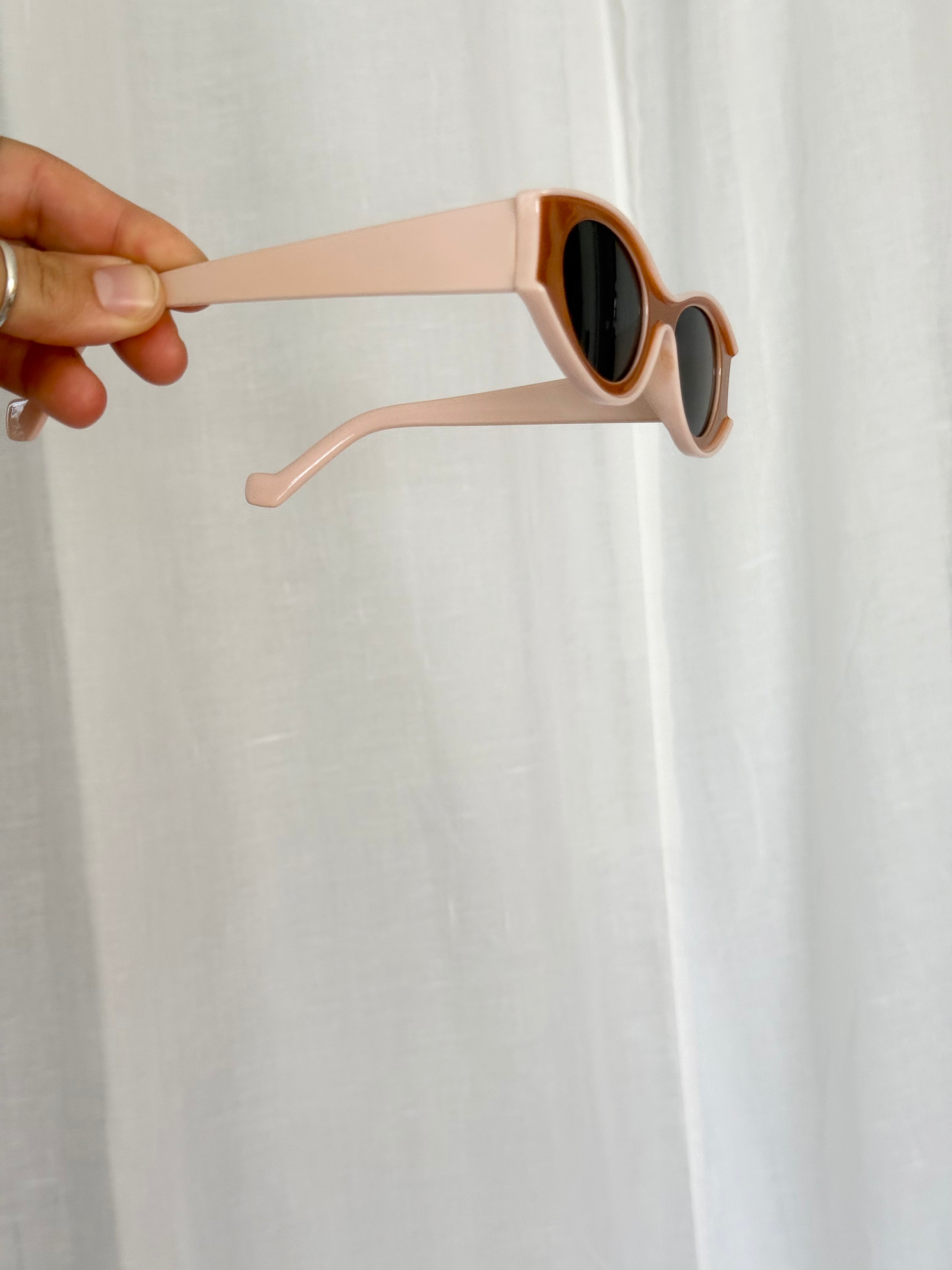 brown and pink oval slim sunglasses