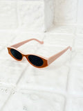 brown and pink oval slim sunglasses