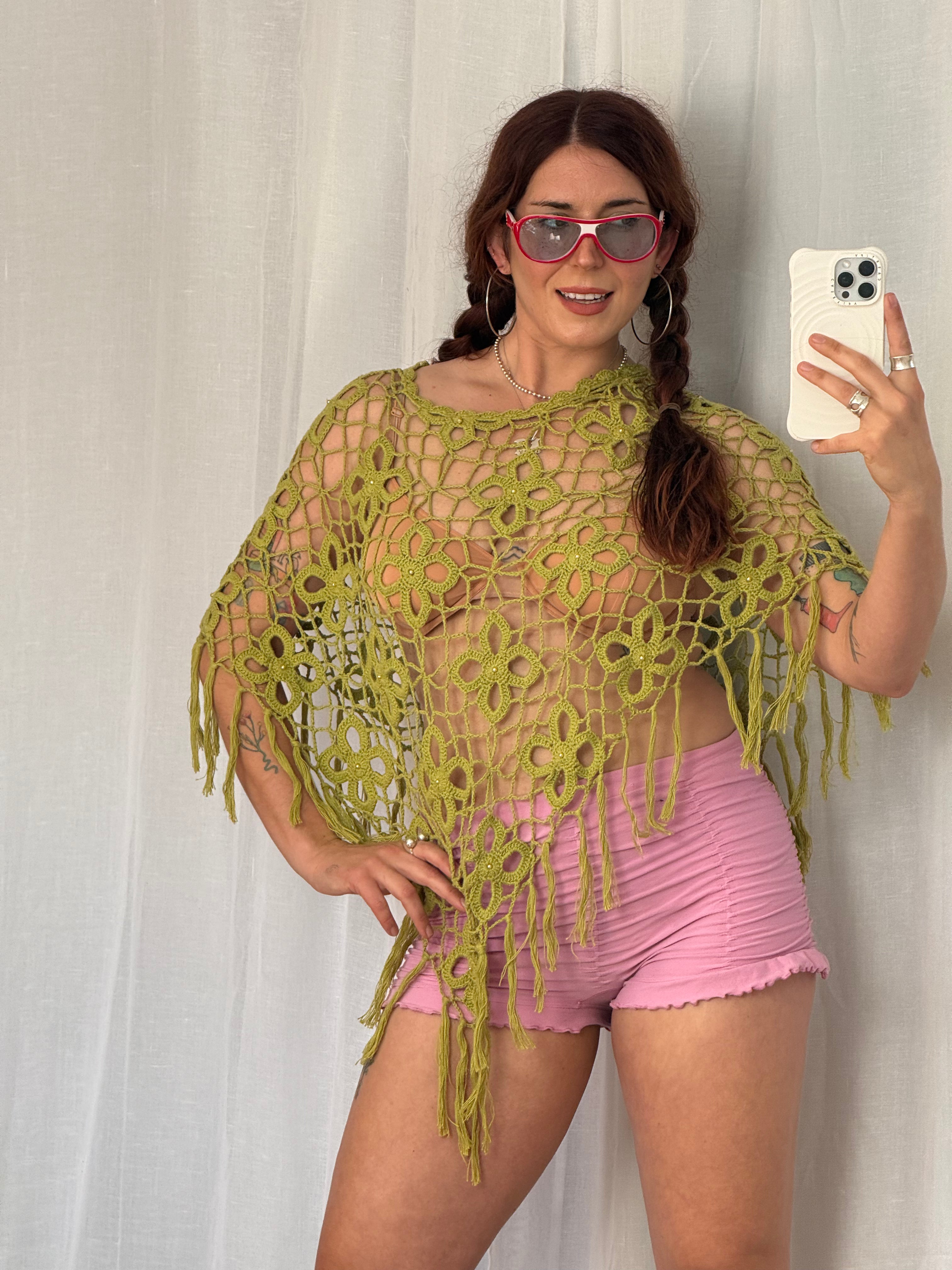 green crochet flower poncho