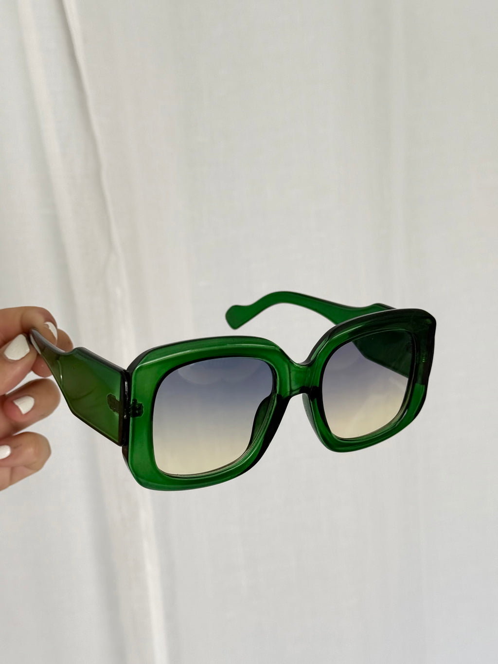 oversized green 70s inspired sunglasses