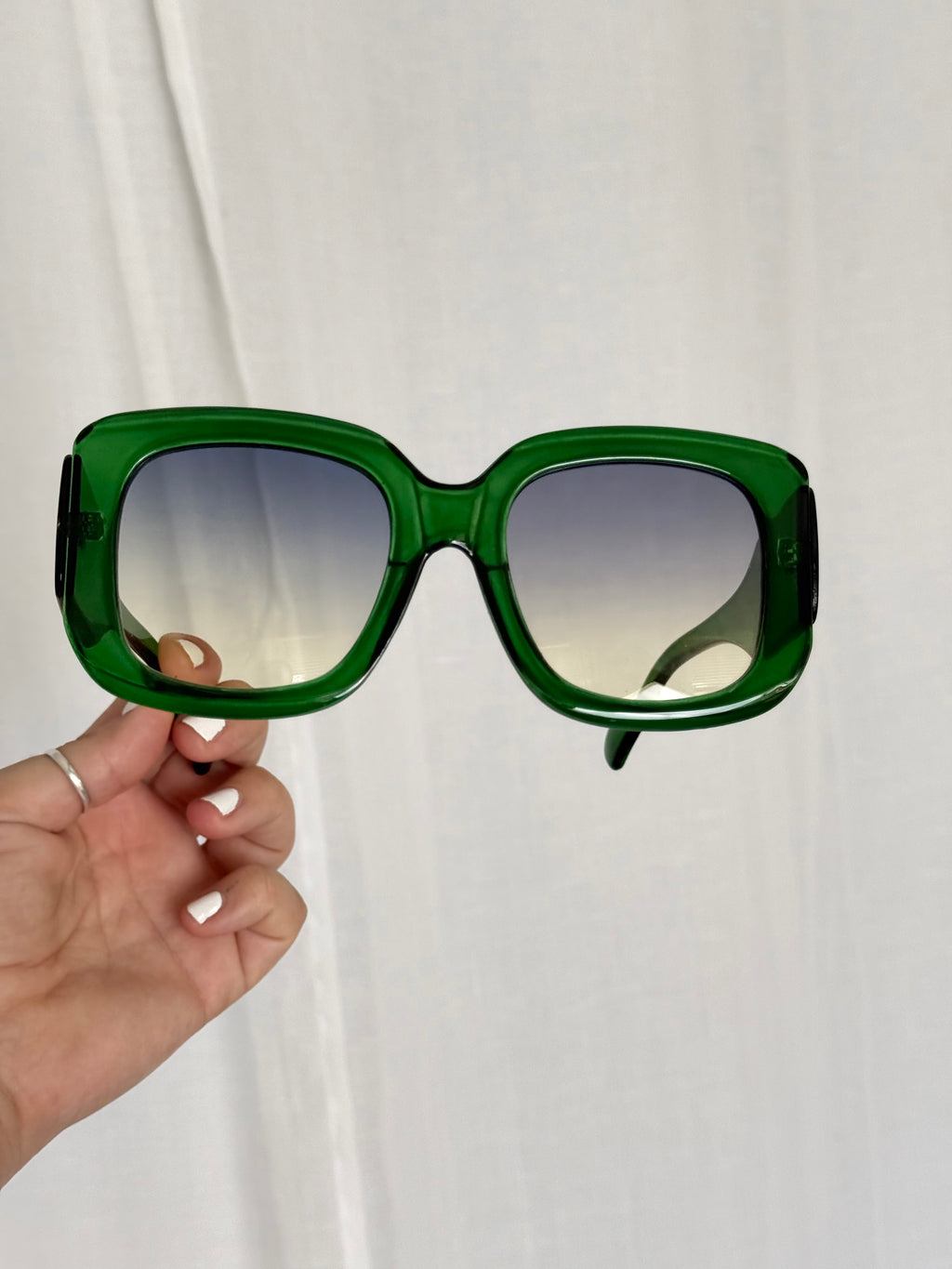 oversized green 70s inspired sunglasses
