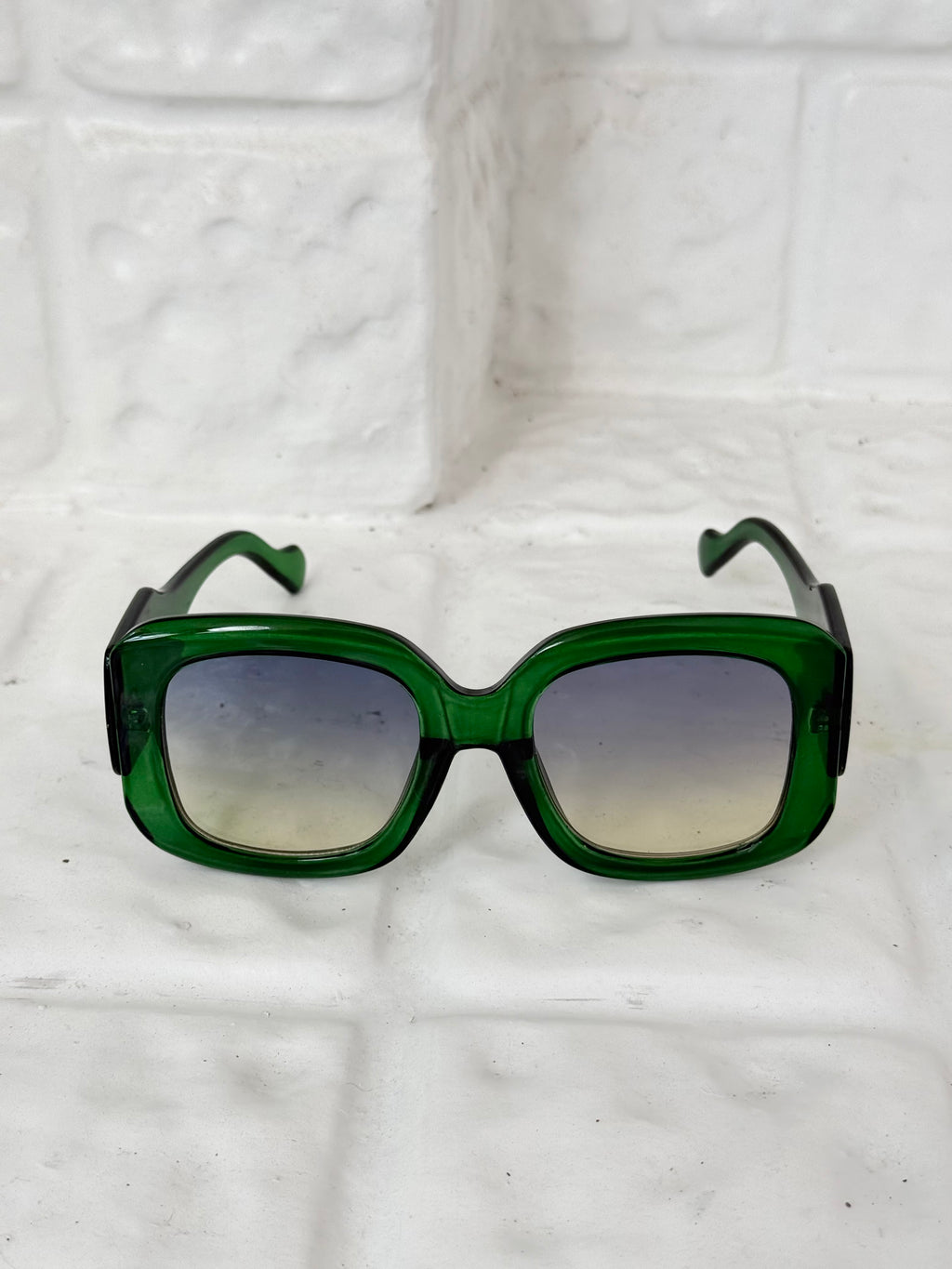 oversized green 70s inspired sunglasses